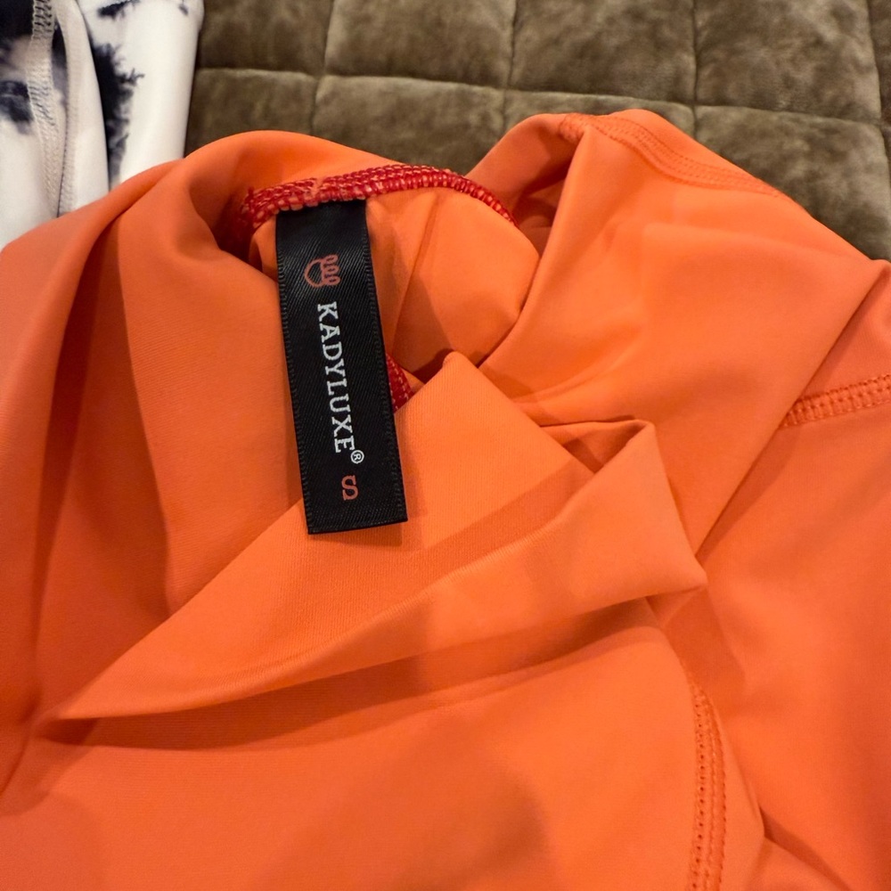 Katyluxe
Women's Orange Jacket